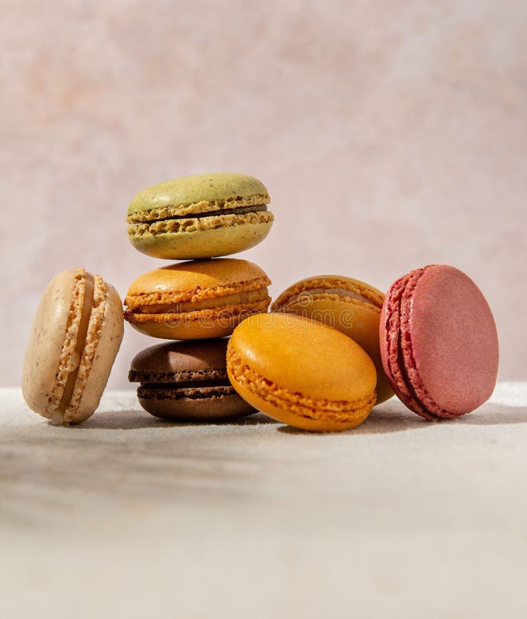 Closeup of a stack of colorful macarons on a table
