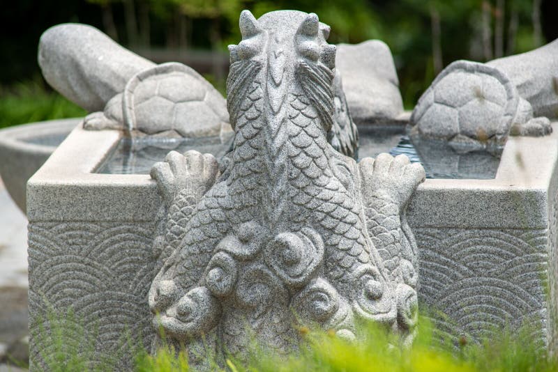 Closeup of Statues on a Water Source in a Park Stock Image Image of