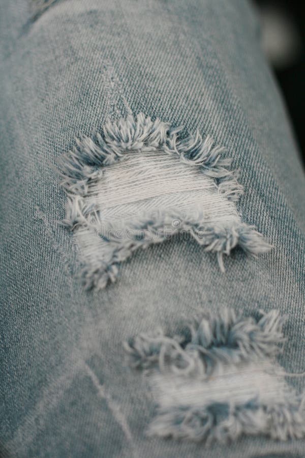 Closeup of Tear in Old Worn Out Jeans Stock Image Image of denim