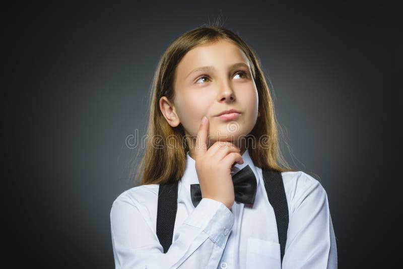 Sad child close up grey background high res stock images