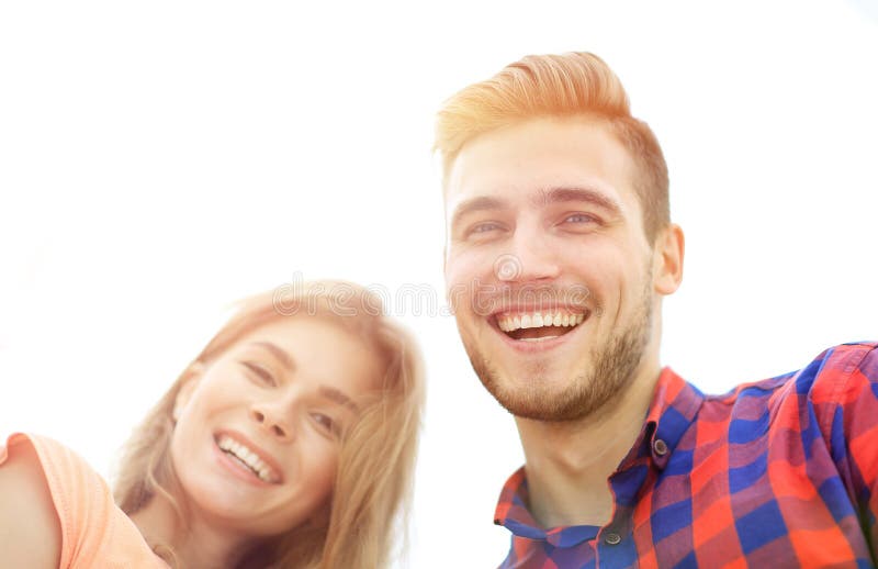 Closeup of three young people smiling on white background royalty free stock images Closeup of three young people smiling on white background royalty free stock images