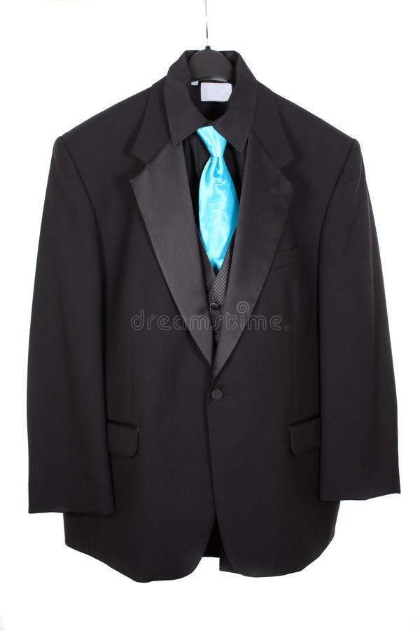 Closeup of three piece suit with blue tie