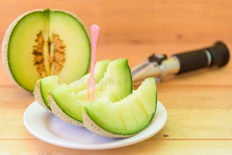 Fresh Green melon in dish stock image. Image of blackberry 162175689