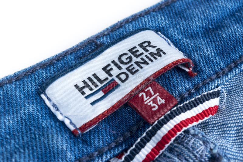 Closeup of Tommy Hilfiger Label on Blue Jeans. Tommy Hilfiger is Lifestyle  Brand. Hilfiger Denim Editorial Photo - Image of designer, denim: 101502721