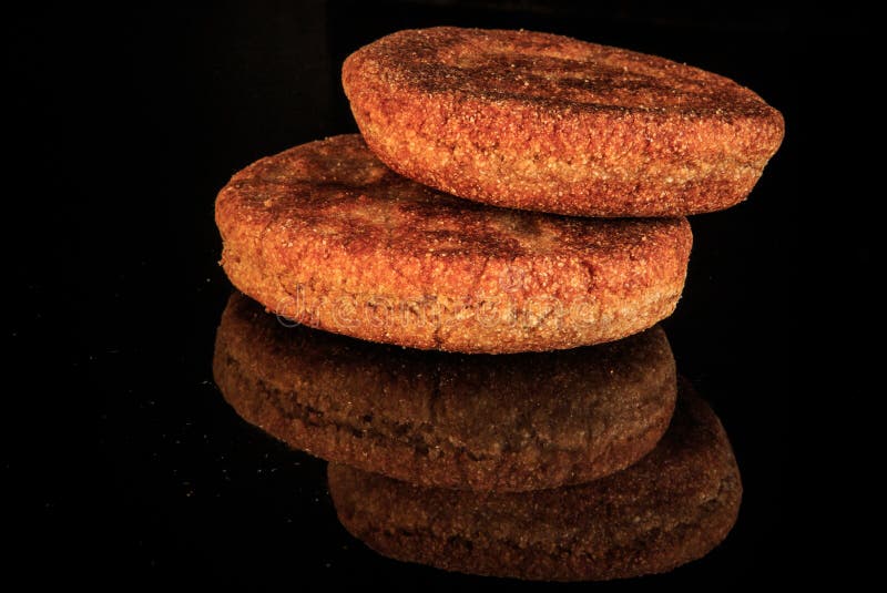 closeup two whole round roasted homemade cereal flapjacks royalty free stock images closeup two whole round roasted homemade cereal flapjacks royalty free stock images