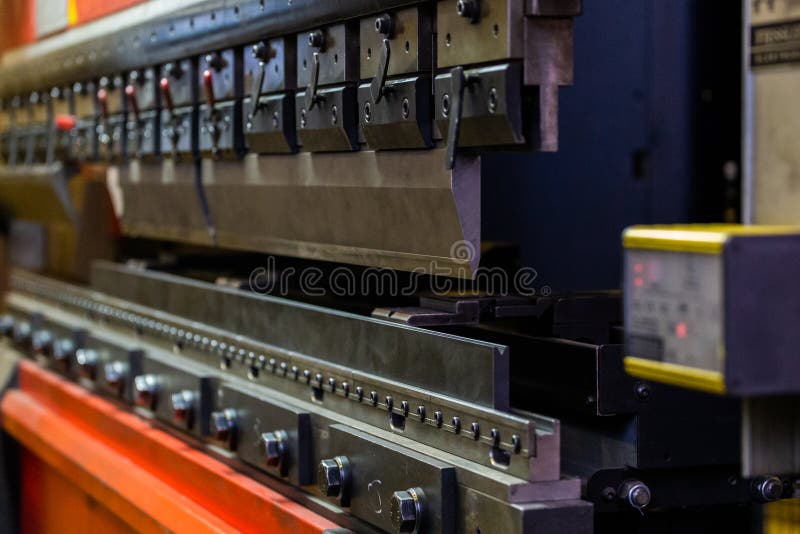 Closeup View of Industrial Sheet Bending Press Brake with Tool Stock