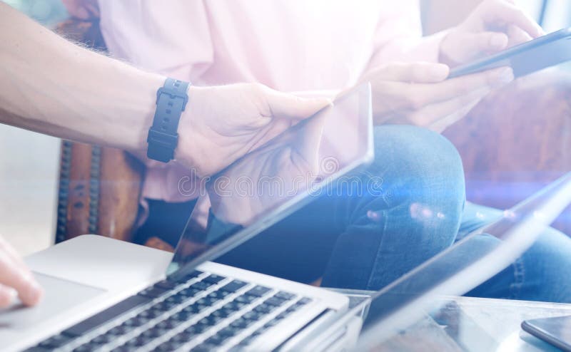 Closeup view of male hand holding digital tablet.Young business team working with new startup project.Blurred background royalty free stock photos Closeup view of male hand holding digital tablet.Young business team working with new startup project.Blurred background royalty free stock photos
