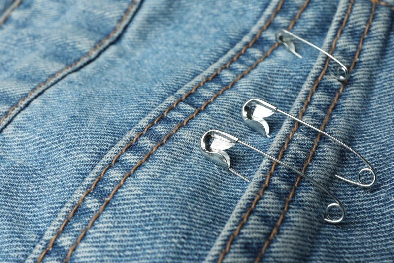 Closeup View of Metal Safety Pins on Clothing Stock Image - Image of ...