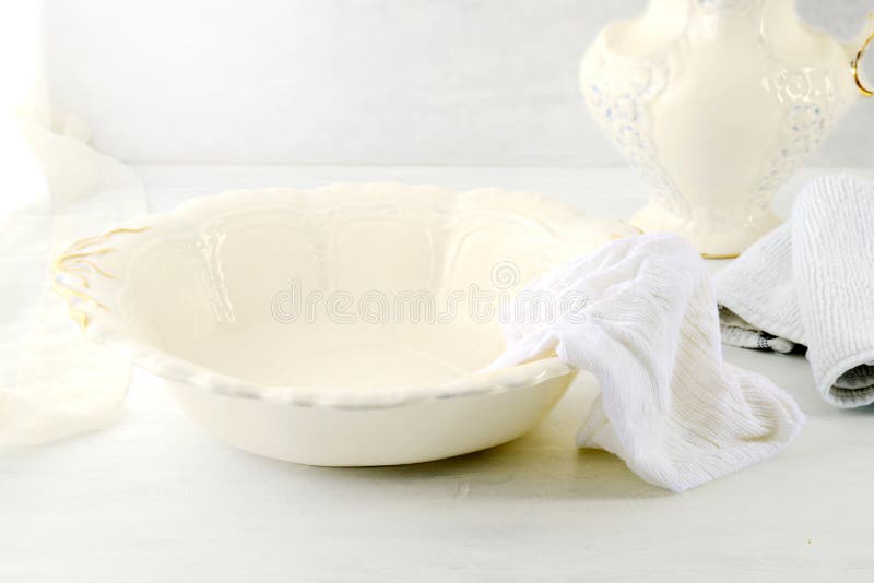 Closeup vintage wash basin and pitcher with towels stock images