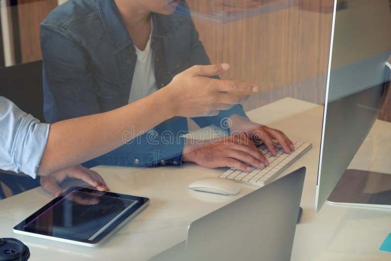 Closeup Website designer planning and meeting application development layout framework coding program on tablet royalty free stock photography Closeup Website designer planning and meeting application development layout framework coding program on tablet royalty free stock photography