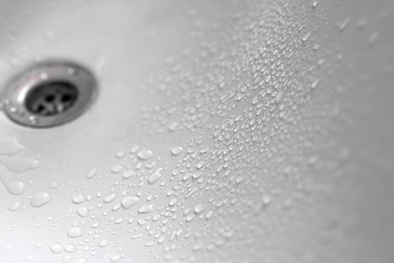 beads of water on bathroom sink