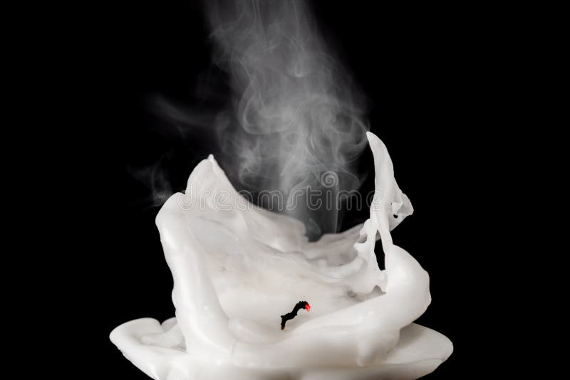 Closeup of white blown out and smoking candle royalty free stock photo Closeup of white blown out and smoking candle royalty free stock photo