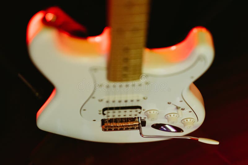 Closeup of a White Electric Guitar on a Stand Stock Image Image of