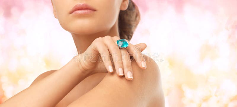 Closeup of woman hand with big blue cocktail ring royalty free stock photo Closeup of woman hand with big blue cocktail ring royalty free stock photo