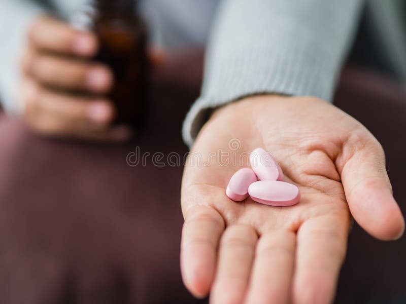 Closeup Woman Hand Holding A Pill Stock Photo Image Of Dose