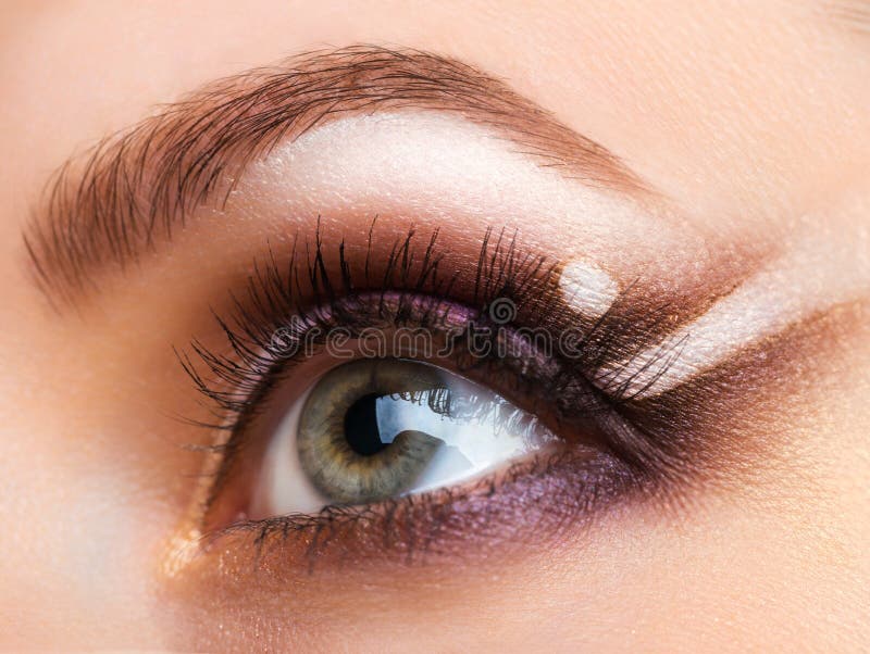 Closeup of womanish eye with glamorous makeup