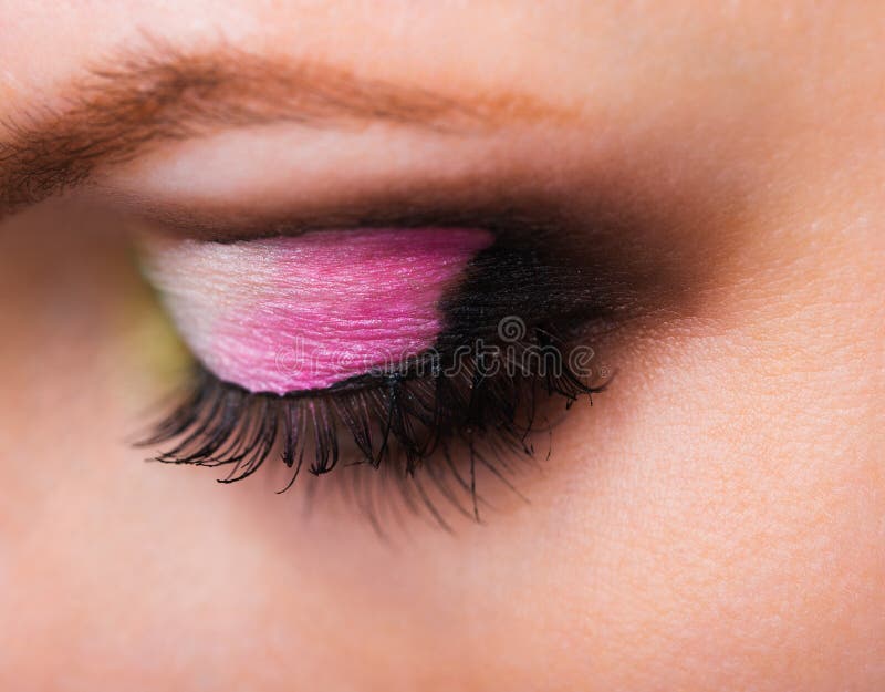 Closeup of womanish eye with glamorous makeup