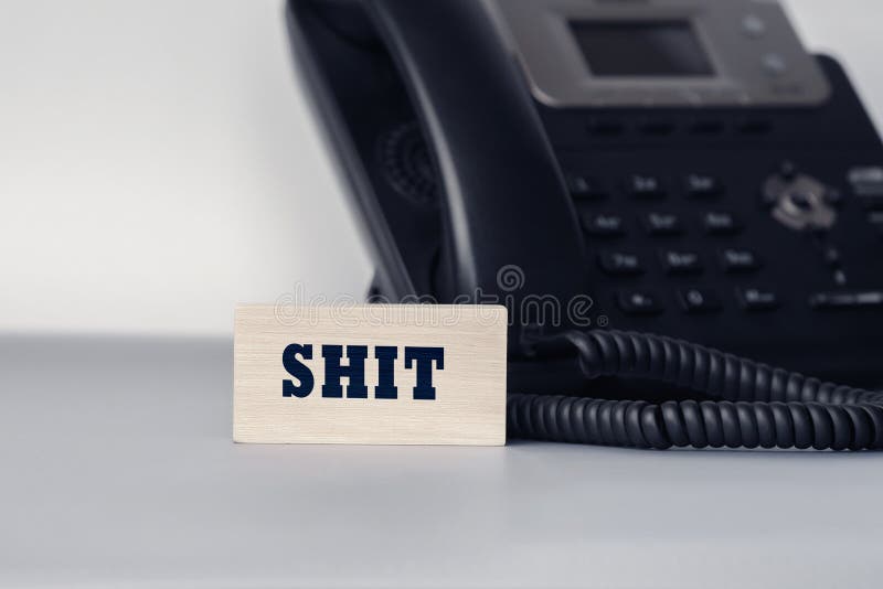 Closeup of the wooden block with text - SHIT stock photos