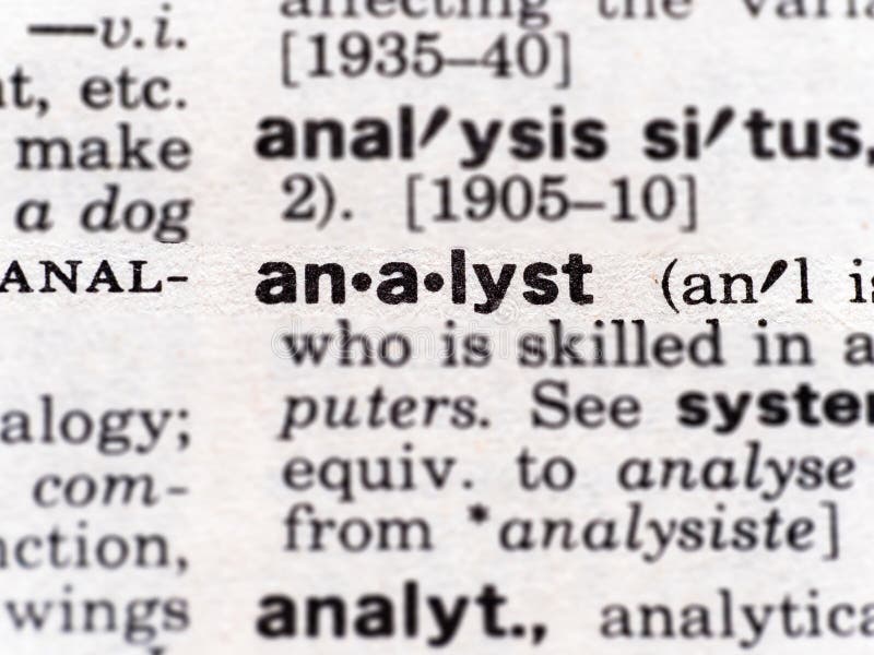 Closeup of the word analyst in the dictionary stock images