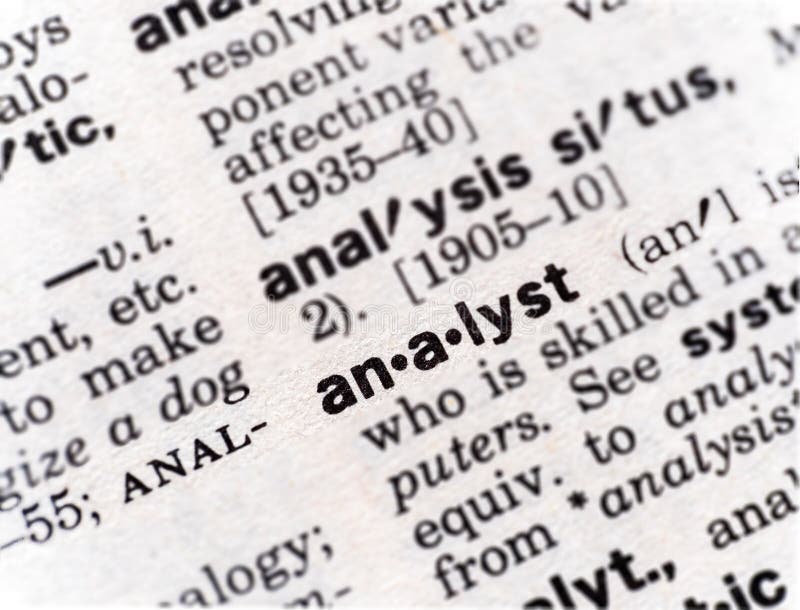 Closeup of the word analyst in the dictionary stock photography