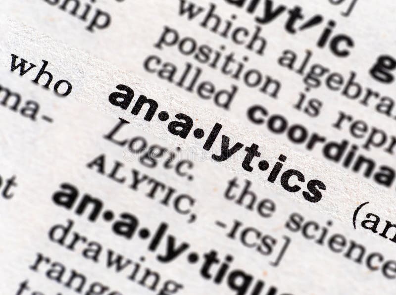Closeup of the word analytics in the dictionary royalty free stock image