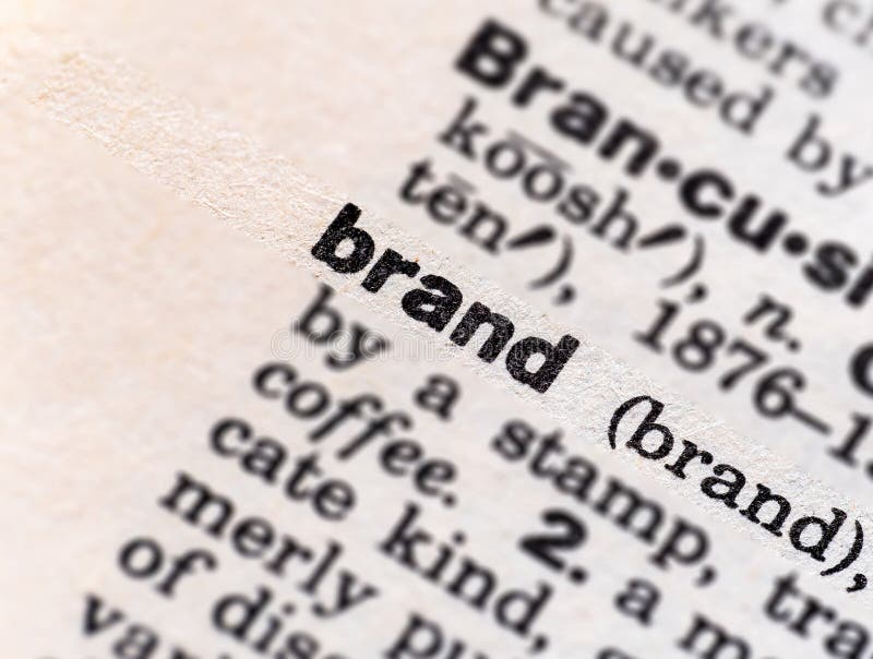 Closeup of the word brand in the dictionary stock photography