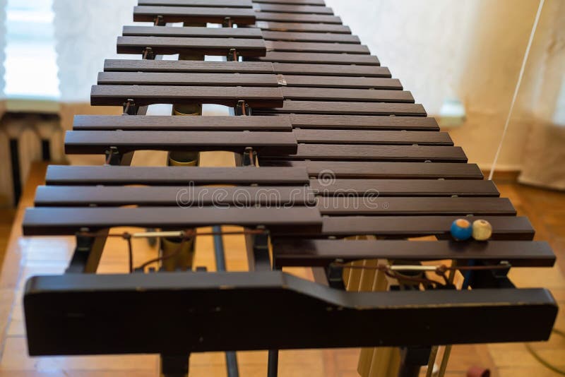 Close up image of zylophone and two mallets. Close up image of zylophone and two mallets