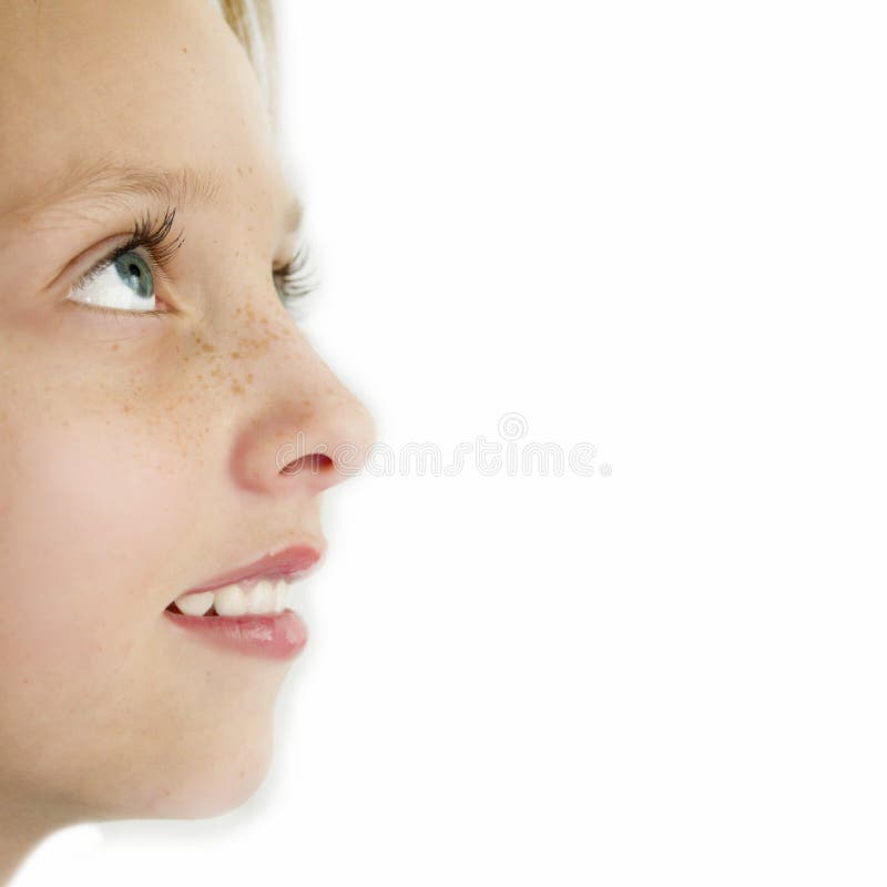 Closeup of young girl in profile royalty free stock photos