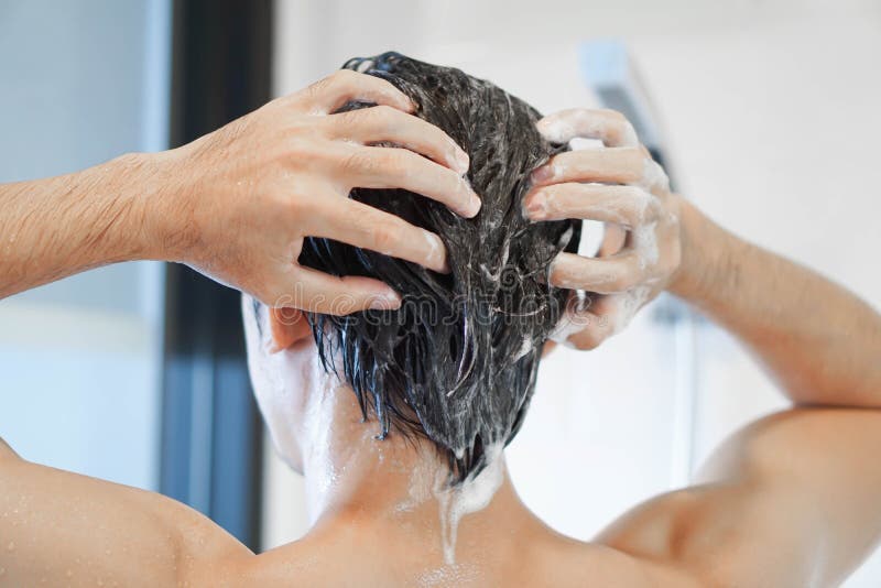 Closeup Men Washing Hair and Taking a Shower in the Bathroom, he Stock ...