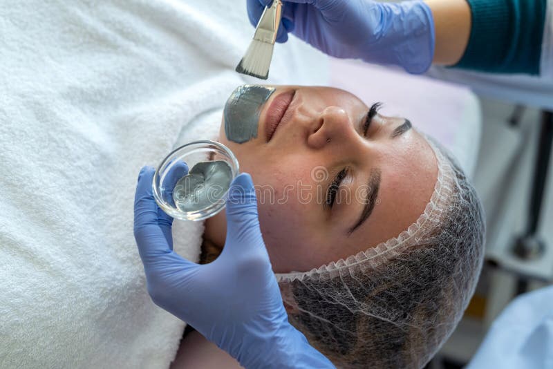 Closeup Of Young Woman Getting Hydrating Procedure Facial Spa Massage By Dermatologist In Clinic