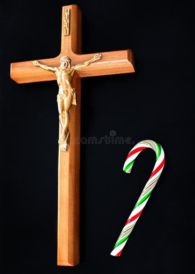 Closeupen av Jesus Christ korsfäste med godisrottingen på fast svart bakgrund fotografering för bildbyråer Closeupen av Jesus Christ korsfäste med godisrottingen på fast svart bakgrund fotografering för bildbyråer