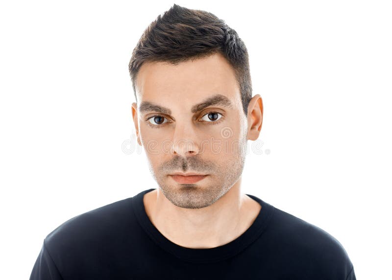 Closeupstående av den unga stiliga mannen som isoleras på den vita backgroen fotografering för bildbyråer Closeupstående av den unga stiliga mannen som isoleras på den vita backgroen fotografering för bildbyråer