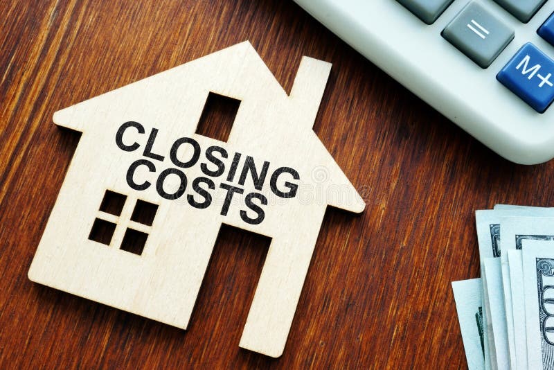 Closing costs. Model of house and money