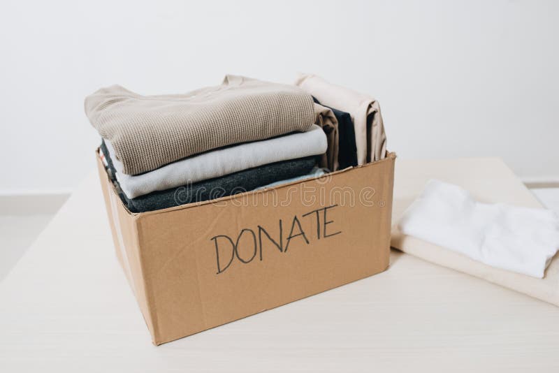 Clothes in Box for Concept Donation and Reuse Recycle Stock Image