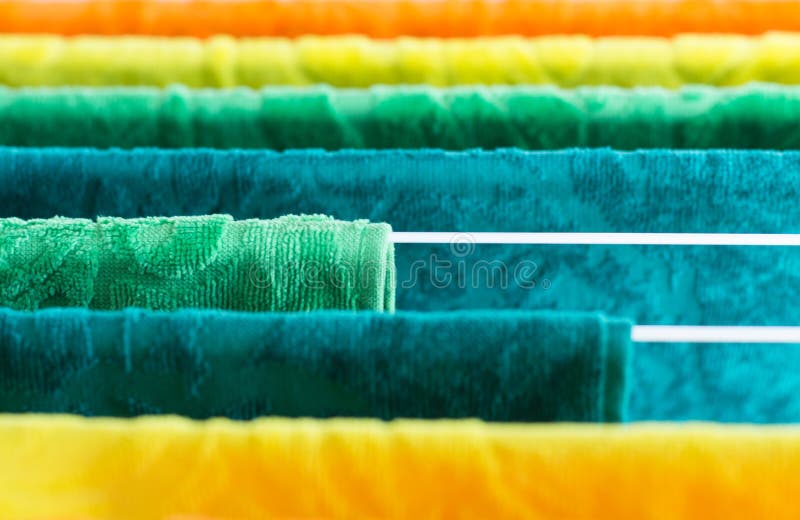 Clothes dryer with towels in sunlight stock images Clothes dryer with towels in sunlight stock images