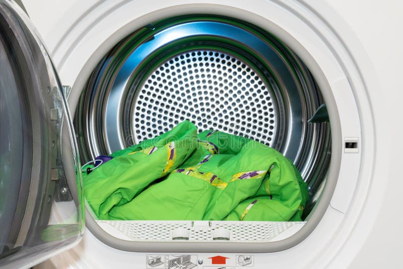 Clothes Dryer with Washed and Dried Outdoor Clothes Inside Stock Image