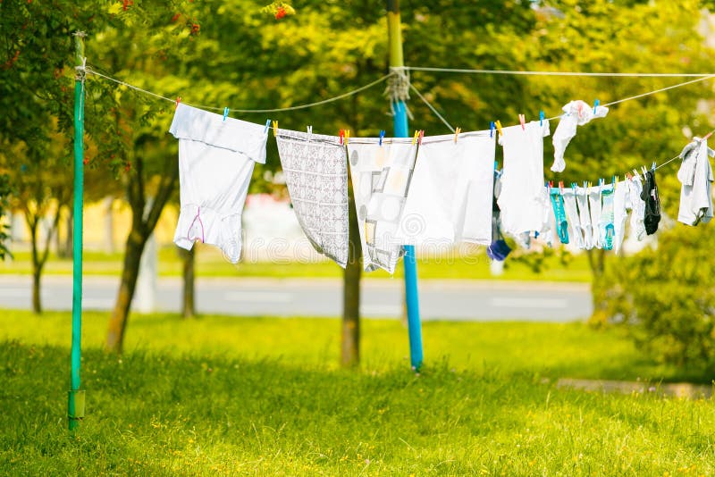 Clothes Drying in Fresh Air on Clothes Lines Stock Photo - Image