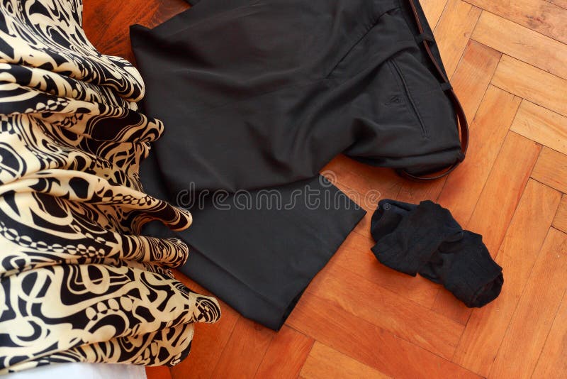 Lingerie and Clothes Thrown on the Floor Stock Photo - Image of