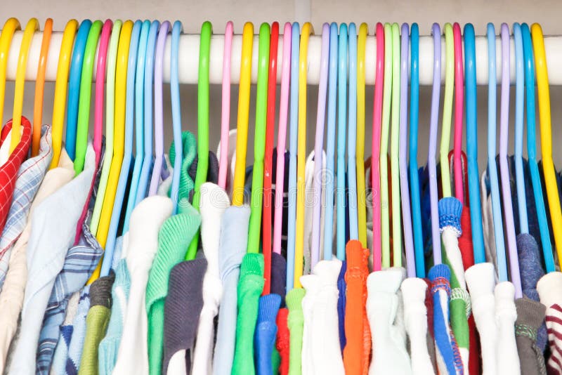Clothes hangers stock image. Image of shirts, tops, cupboard 23062655