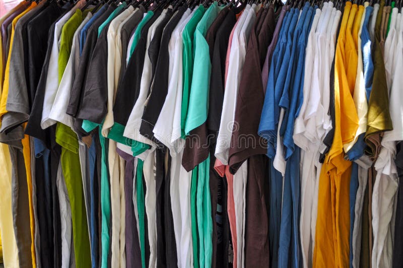 Display of Man Suits in a Closet Stock Photo - Image of closet, male ...