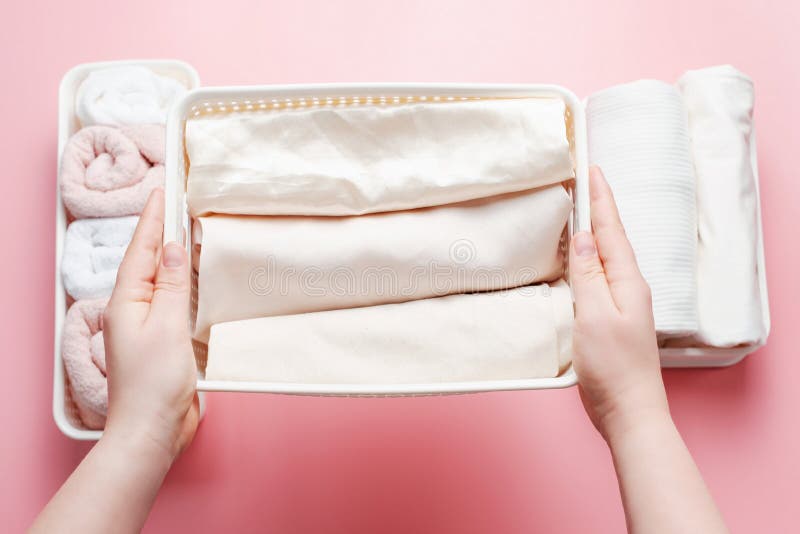 Clothes in Plastic Containers Top View, Space Organization Concept