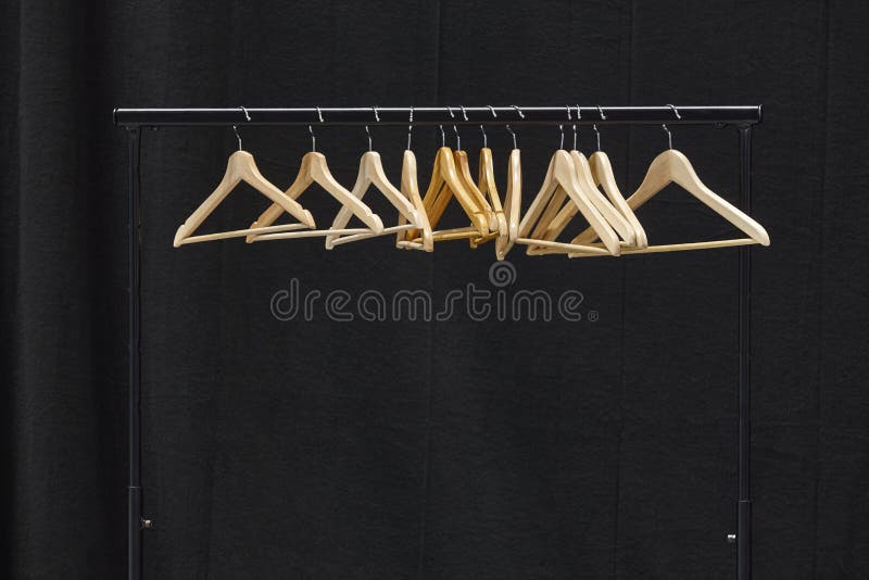 Clothes Rack with Hangers on a Dressing Room. Showroom Set Stock Photo
