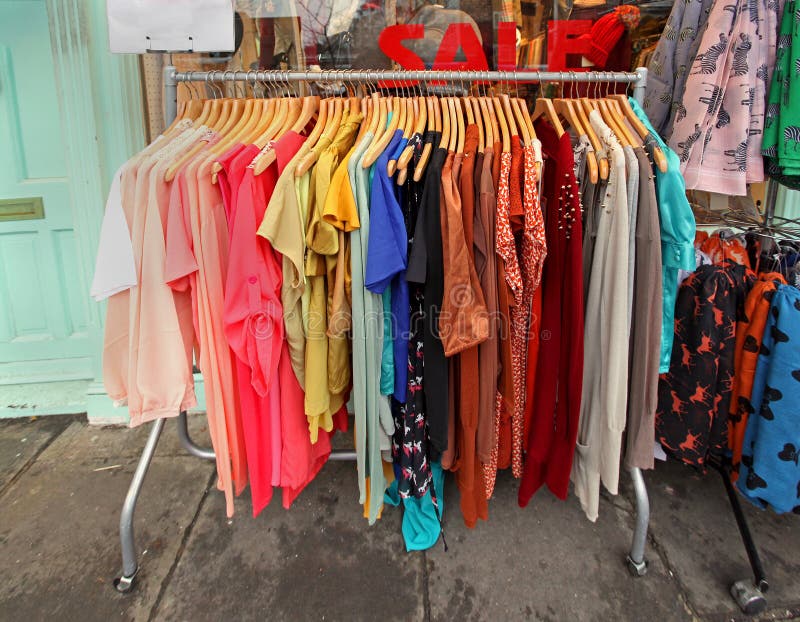 https://thumbs.dreamstime.com/b/clothes-sale-colorful-rack-outside-fashion-store-34214144.jpg