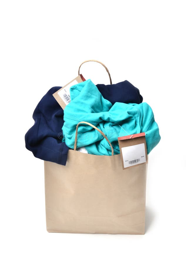 Clothes in a shopping bag stock photo. Image of business 42010054