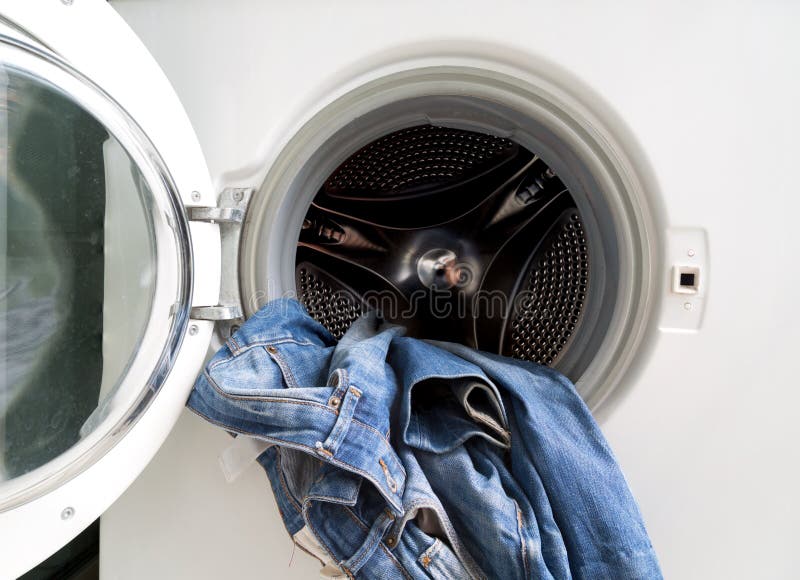 Clothes in washing machine stock image. Image of bubbles 55983279