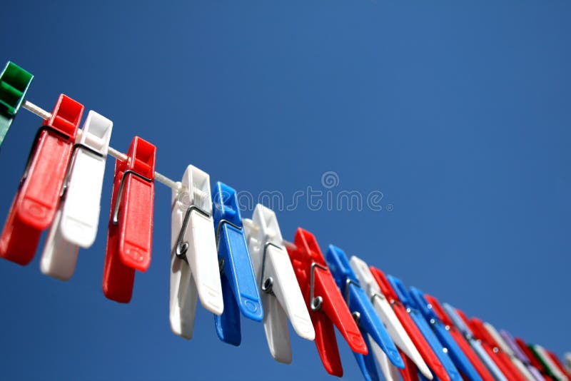 Clothesline and Pegs on Blue Sky Background Stock Photo Image of