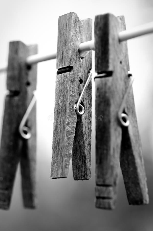 Clothespins on clothesline stock photo. Image of white 7512612