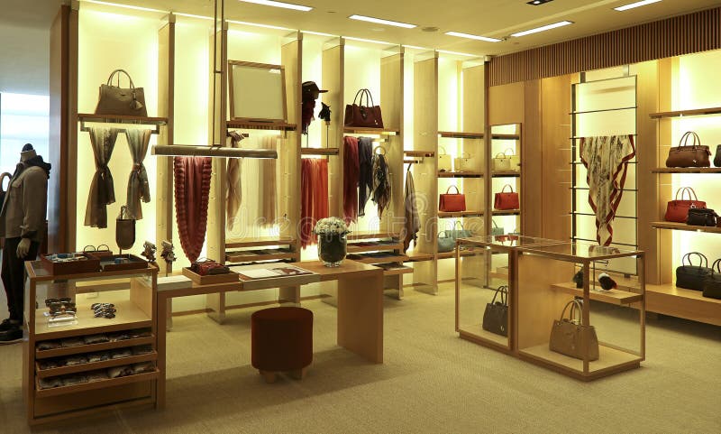 Interior view of a luxury clothing and accessories boutique. Interior view of a luxury clothing and accessories boutique.