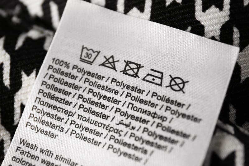 Clothing Label with Care Symbols and Material Content on Shirt, Closeup ...