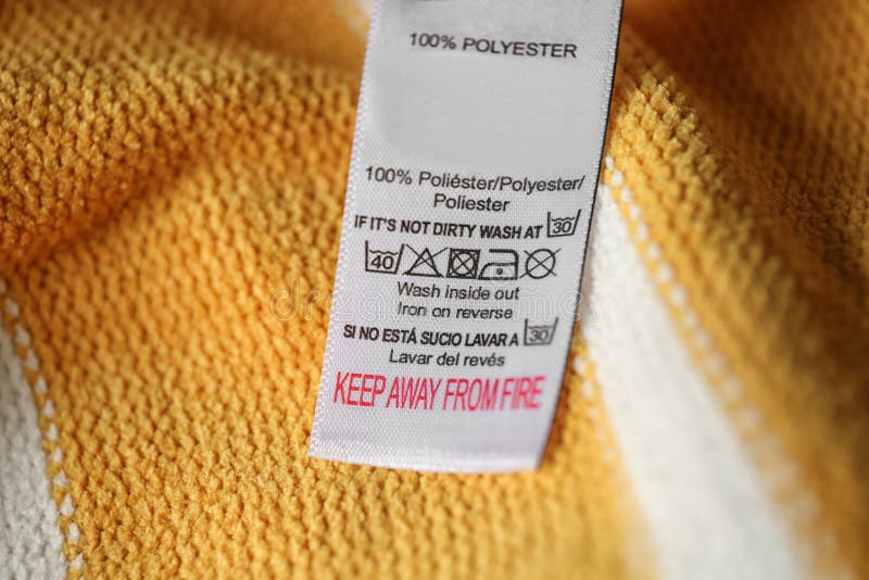 Clothing Label with Care Symbols and Material Content on Shirt, Closeup ...